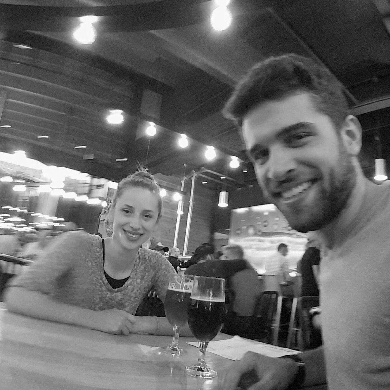 In 2016, Julia moved from Boston to live with Zach in Minneapolis. Here's a photo of them drinking their first of many beers together at Surly Brewing.