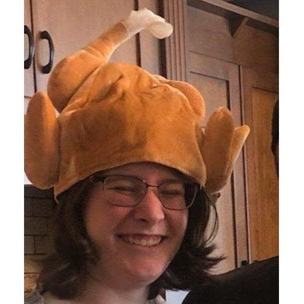 November 2021: We joined Nolan's family for Thanksgiving up in North Carolina where we played lots of cards and we were decorated with the ceremonial Turkey Hat.