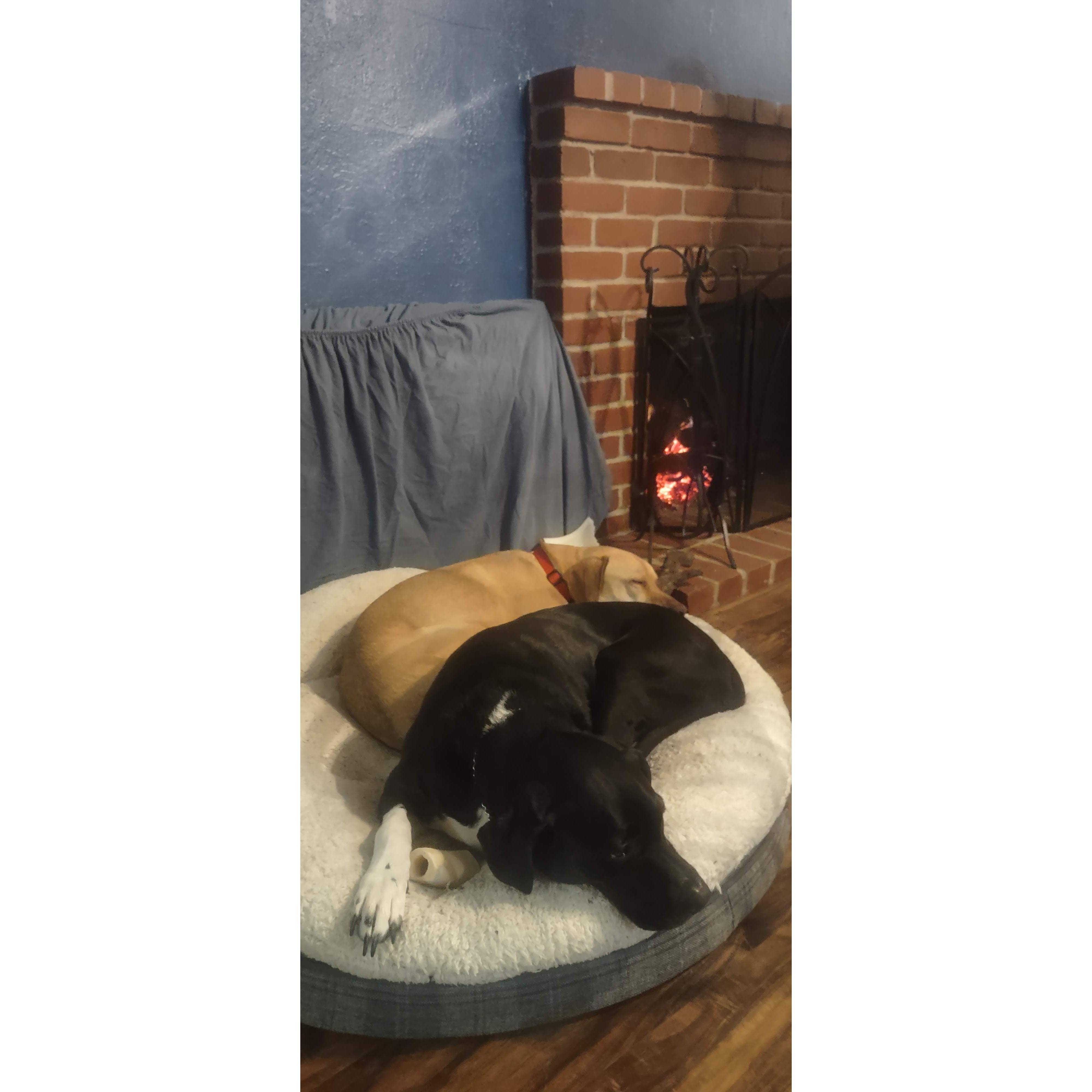 Libby and Faron enjoying the fire for the first night in our new home, Feb 2024
