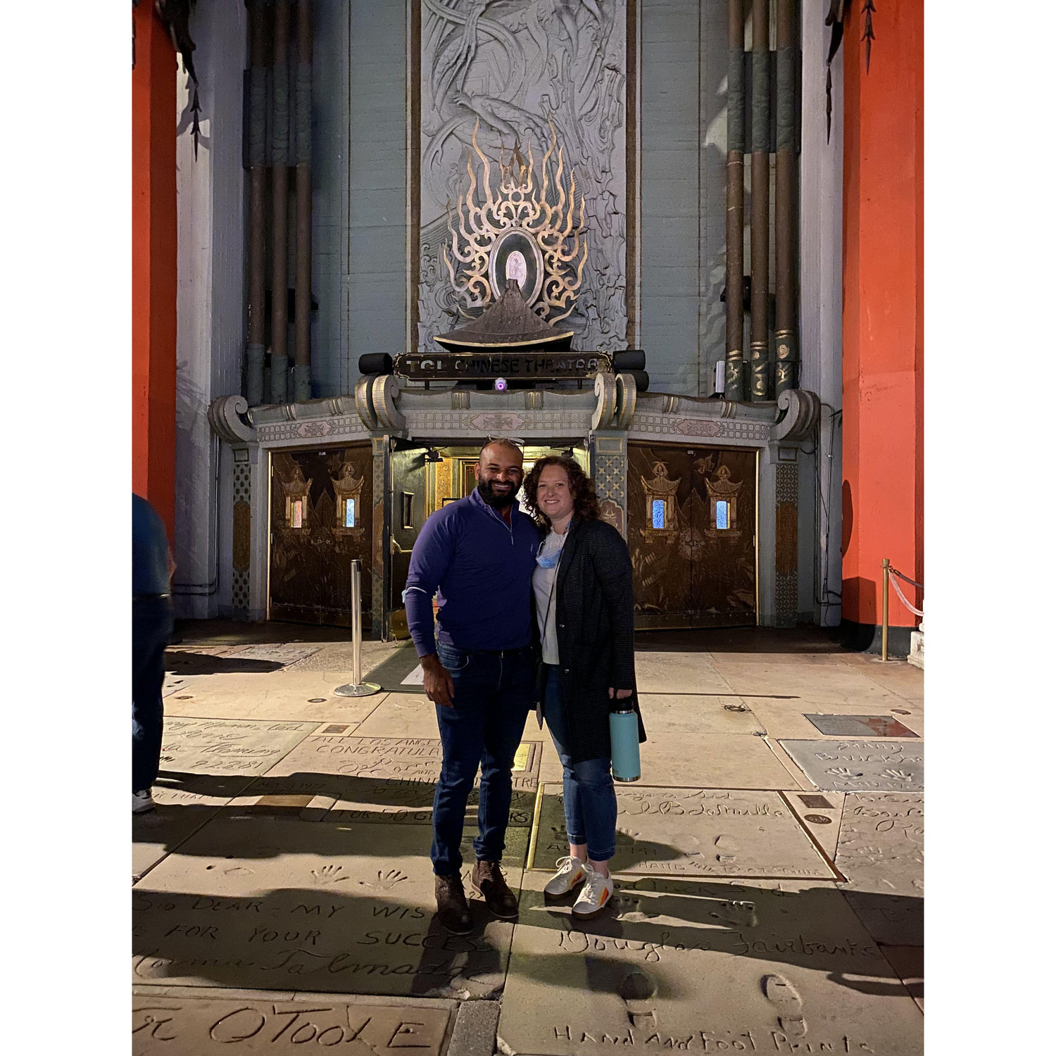 Our first picture together. Taken after one of our first dates when we took a stranger's photo for them and they asked if we wanted one. We both hesitantly said 'sure'...
