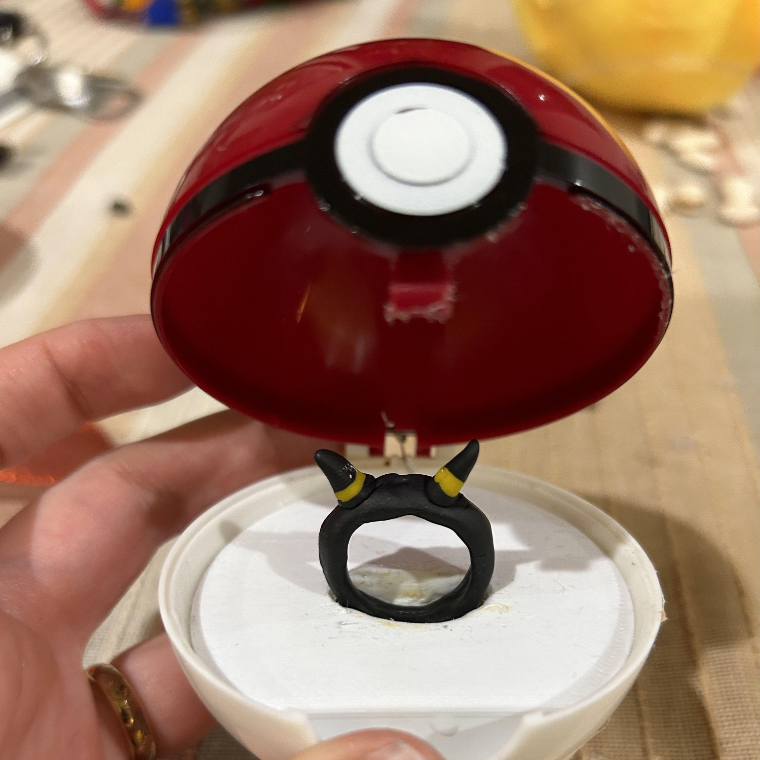 Mary then proposed to Paul by making him a clay Umbreon ring, presented in a Pokeball.