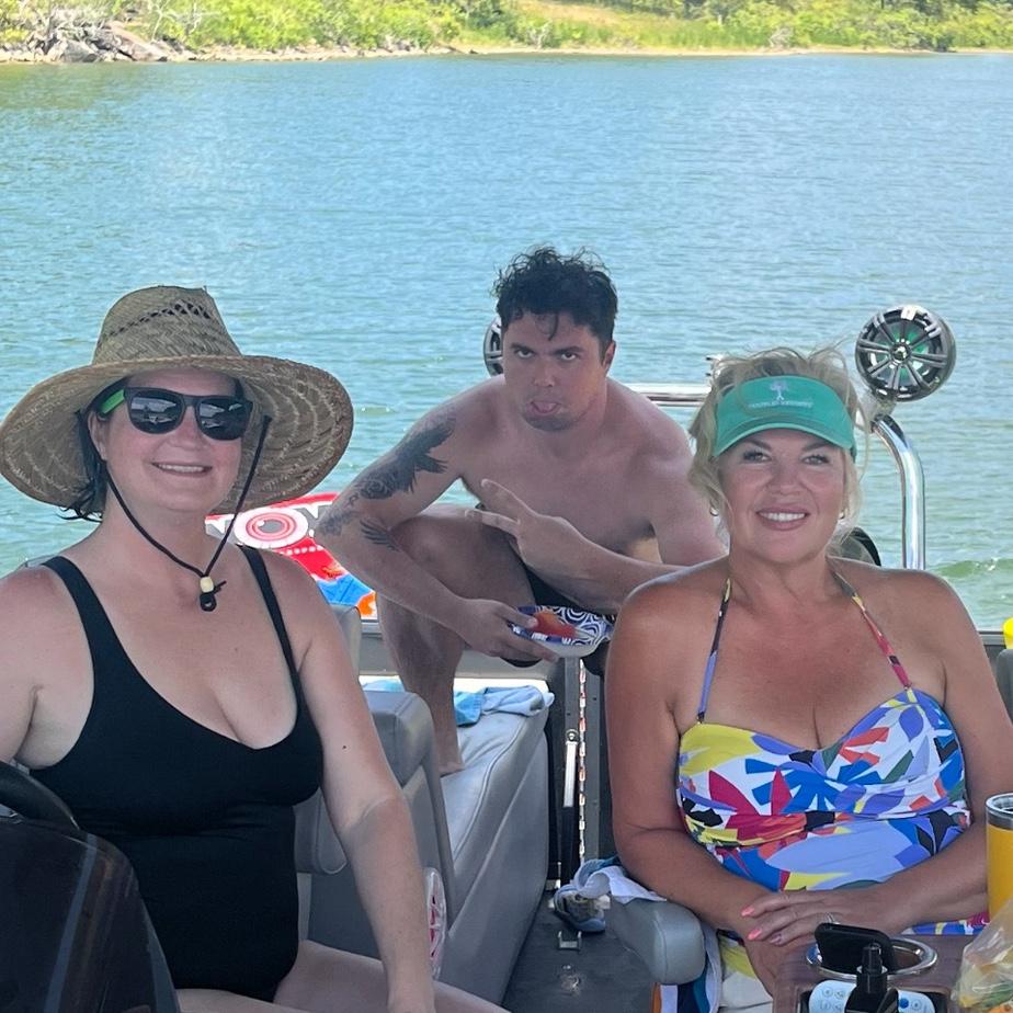Amanda, Michael and I on our boat at Tenkiller.
