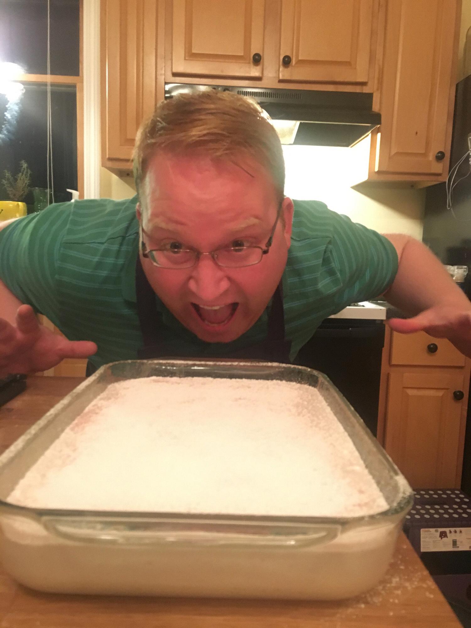 Ben attacking a pan of homemade marshmallows