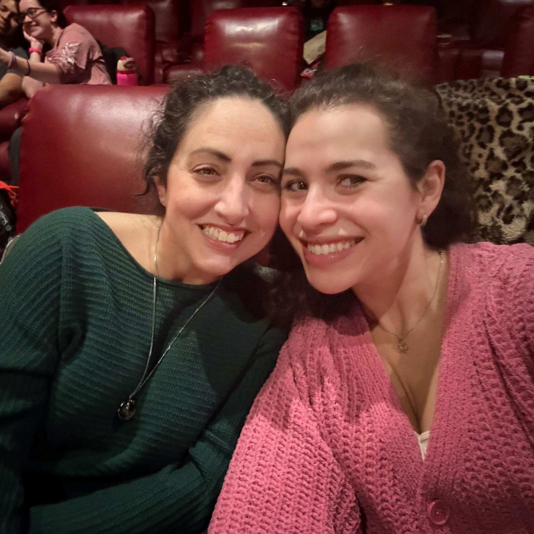 At Wicked: For Good, one year after seeing the first Wicked movie on our second date in the same theater (green and pink for Elphaba and Glinda)