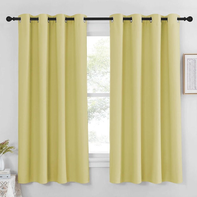 NICETOWN Blackout Curtain Panel 63 inch Long for Window - Thermal Insulated Solid Grommet Blackout Drape for Bedroom Living Room Kitchen (Single Panel, 52W x 63L, Paler Yellow)