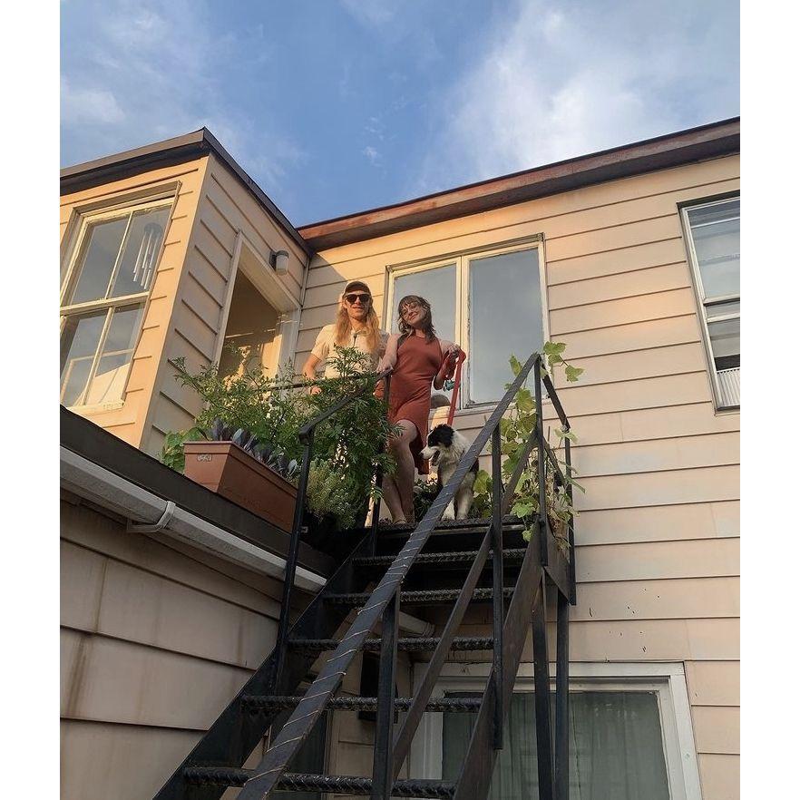 A view of our apartment in Troy, NY and modest "rooftop garden". This photo was taken just a few weeks after getting our puppy, Freddy.