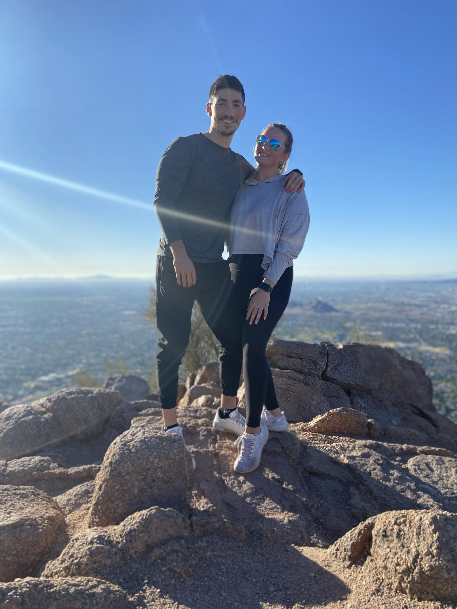 This photo was captured in 2021 when Mary and Grant hiked up Camelback Mountain in AZ.