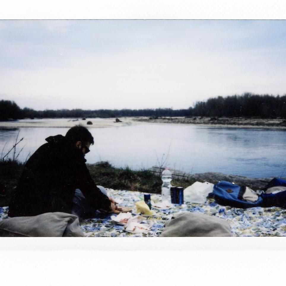 Sarah and Ale enjoy a picnic next to the river outside of Milan on the first real day of spring weather, 2017