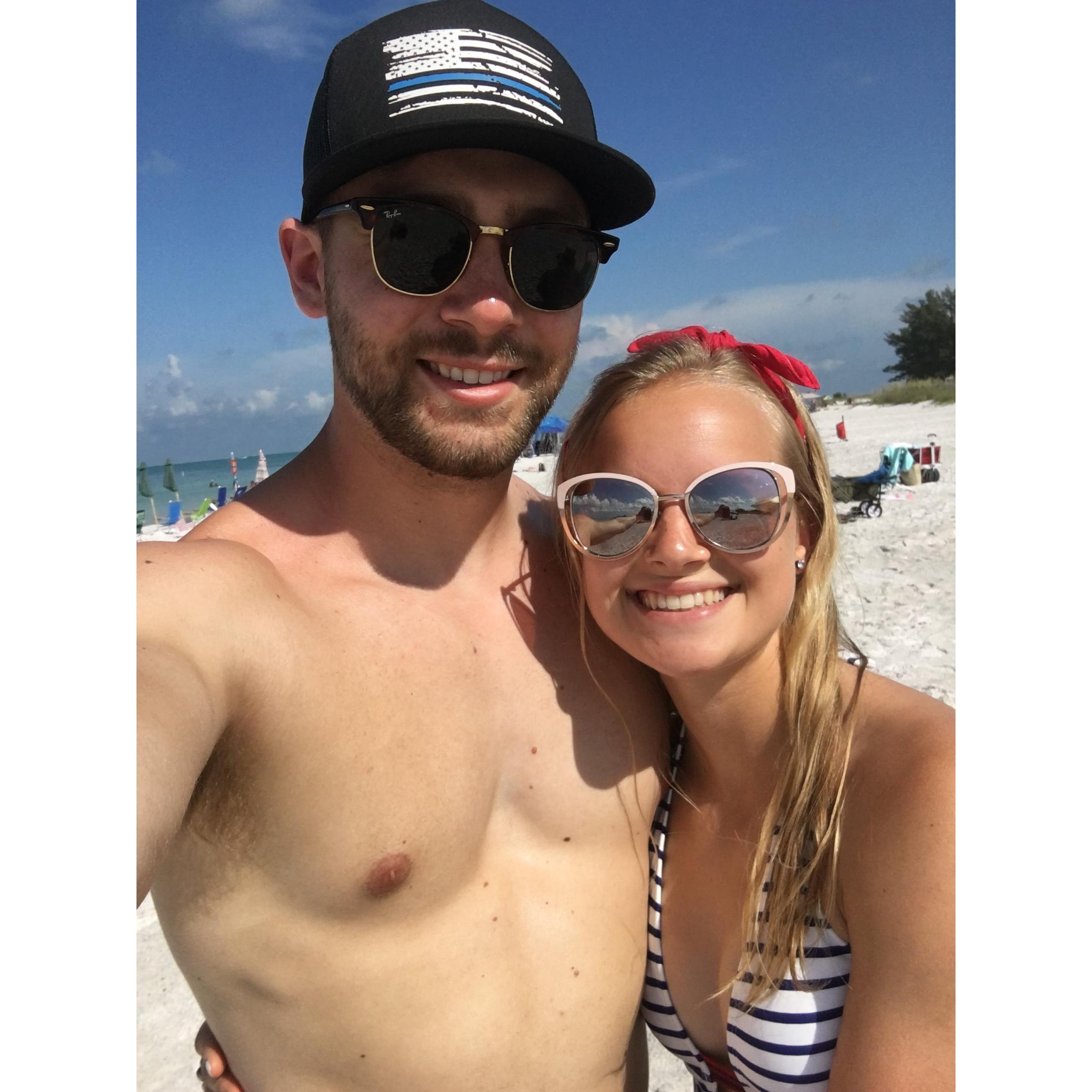 Beach time! I read books and Andrew people watches LOL. A match made in heaven!