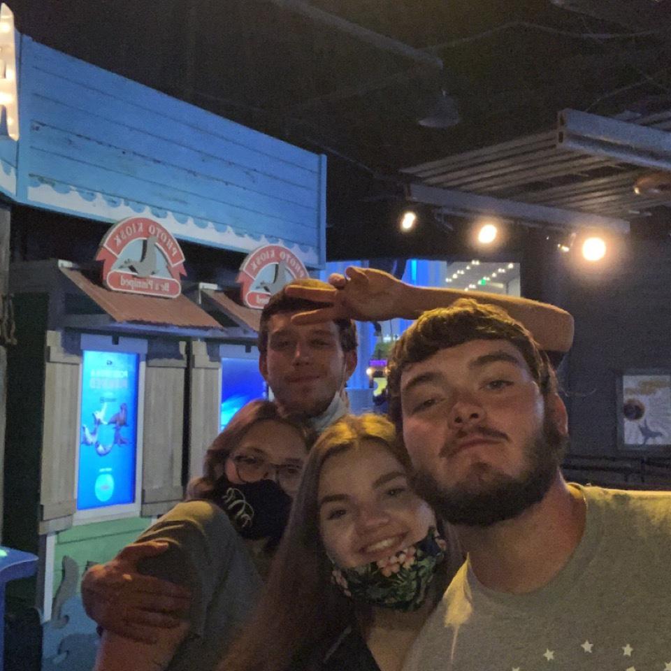 The bride and groom at the Georgia Aquarium with our Maid of Honor and Best Man!