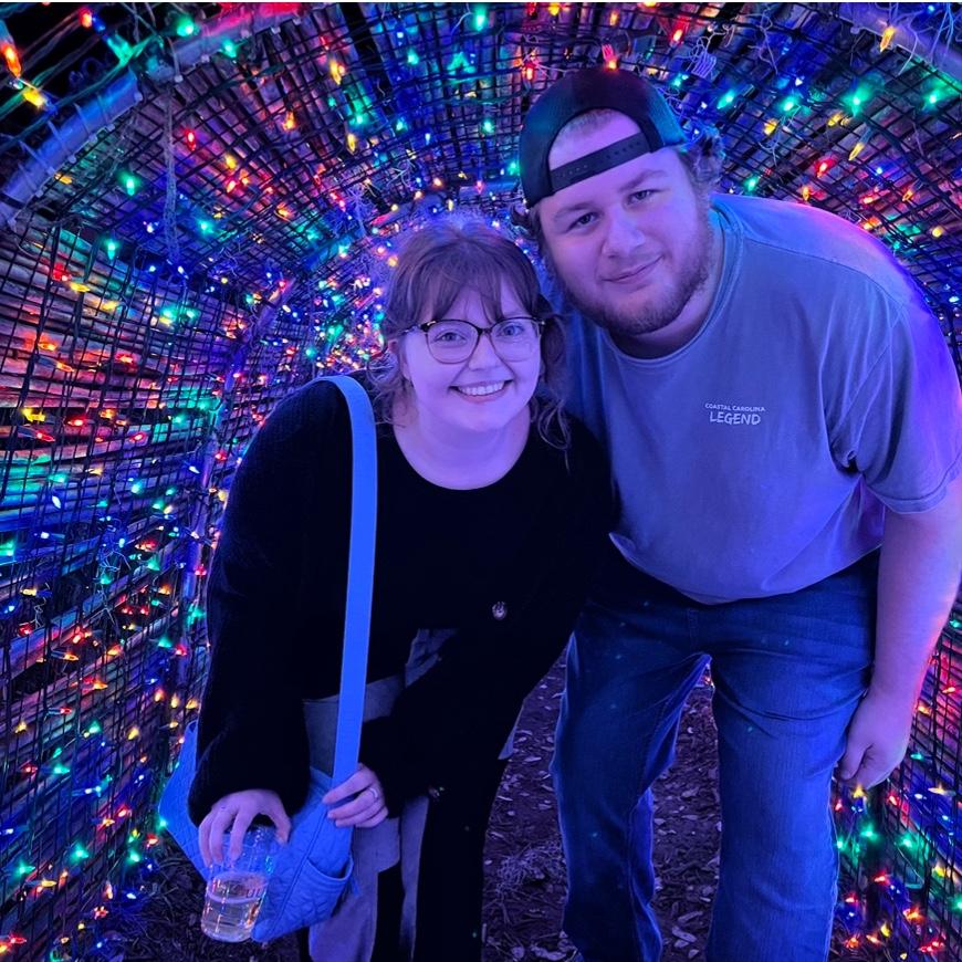 Our yearly tradition of going to Brookgreen Gardens during the Night of a Thousand Candles and taking a picture in the tunnel! December 2022