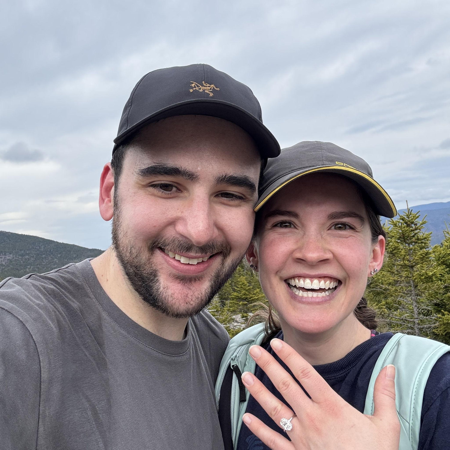 4/19/25 we got engaged! Kevin proposed on the second mountain top of the Welch Dickey trail in the White Mountains. He got down on his knee to get the sandwiches and got a ring instead!