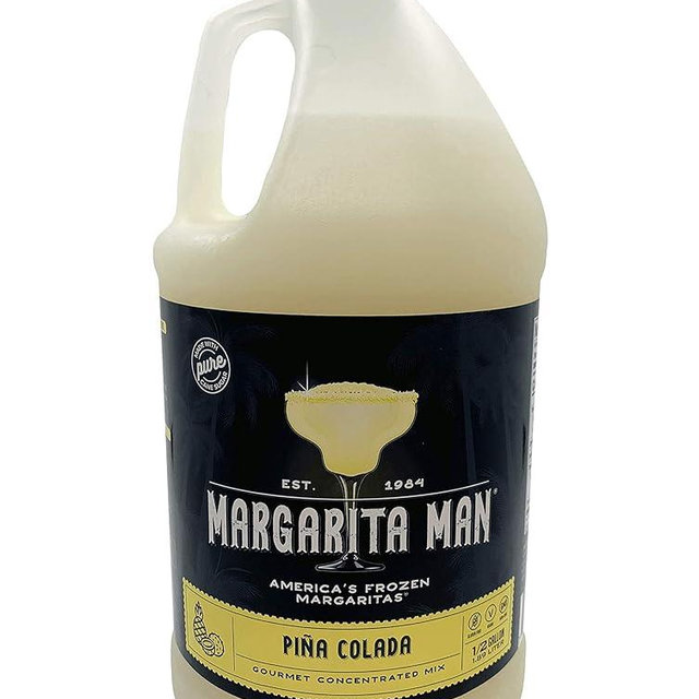 Margarita Man Piña Colada Mix | 64oz bottle, makes 56 drinks | Made with Pure Cane Sugar…