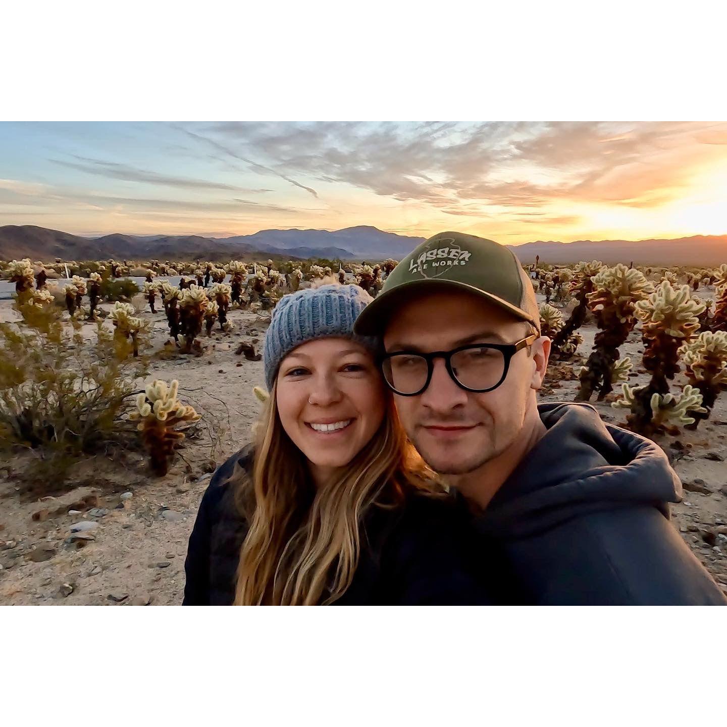 We love traveling and getting outside! This was taken at sunrise in Joshua Tree