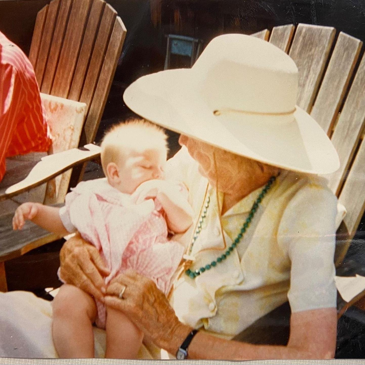 Great Grandma Ruth holding Natalie on the deck in 1996