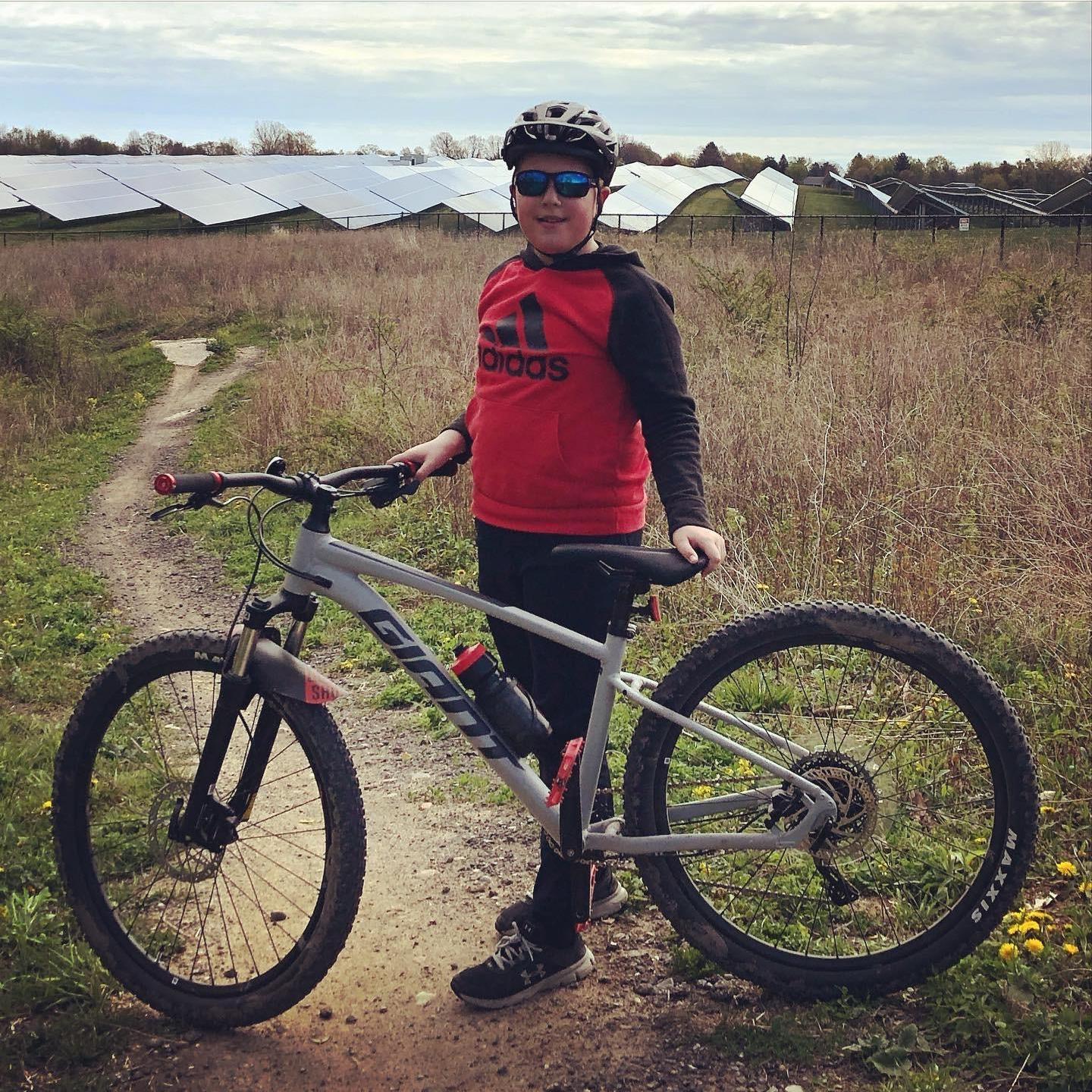 Cori helped Tyler get his first "real" mountain bike and they love riding together when they can.