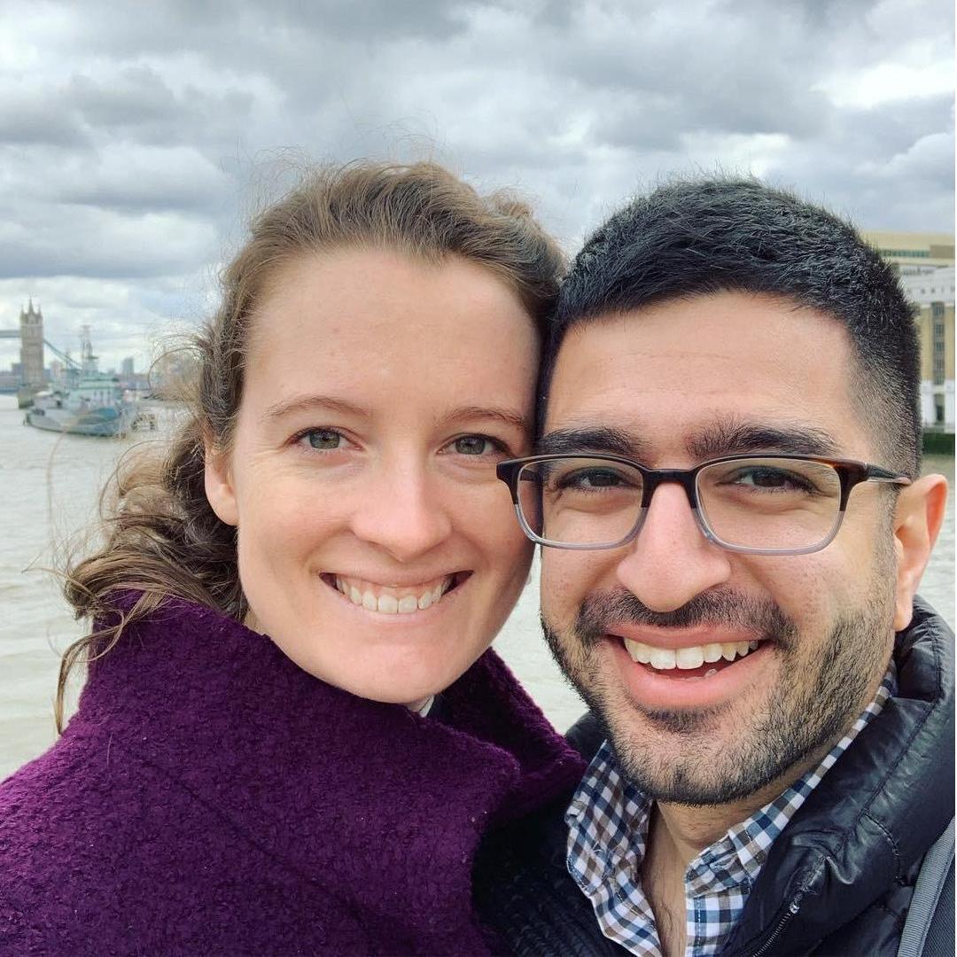 Smiling in front of the Tower Bridge in London