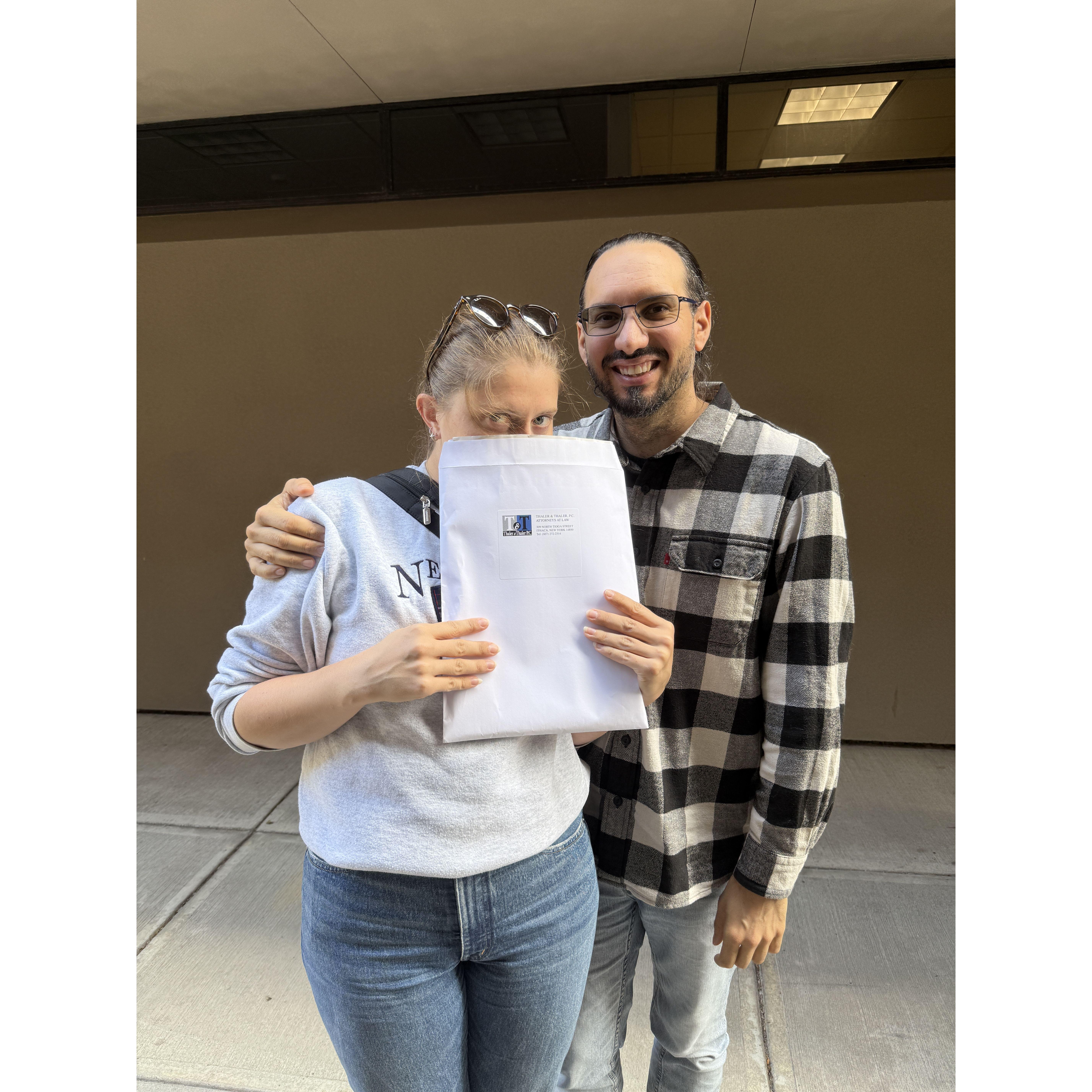 Dani and Fabio just after finalizing the purchase of their first home