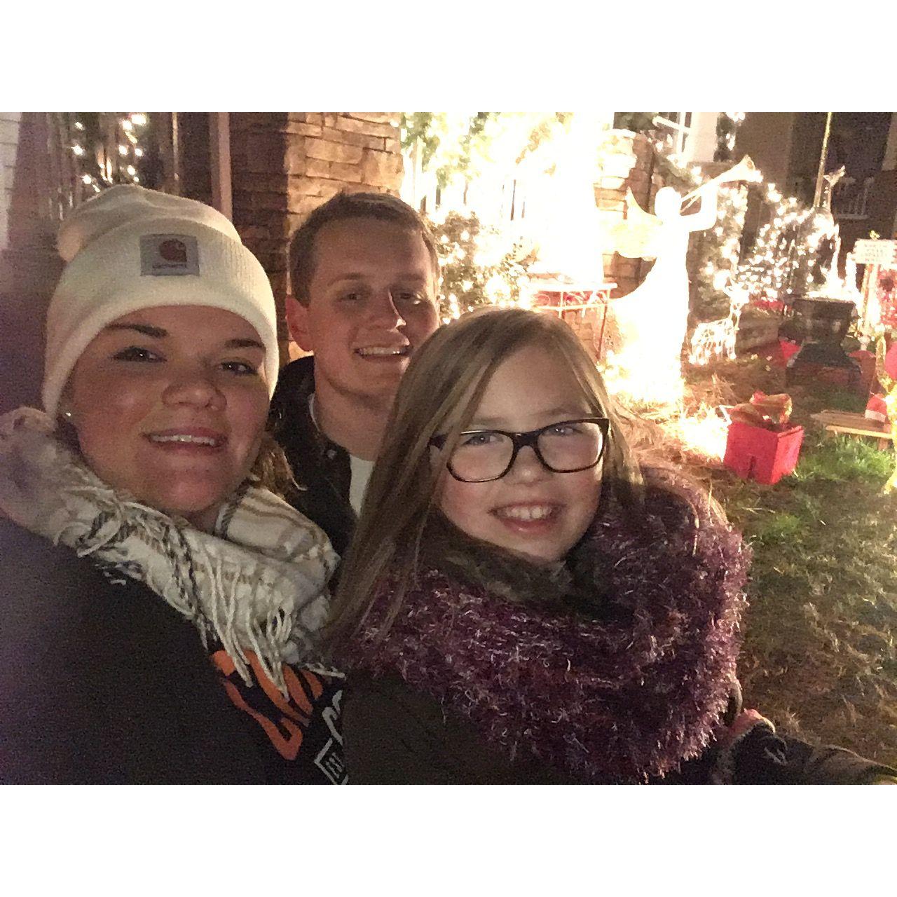 Jenna Bean (now a Junior Bridesmaid) and I taking Quinton through the McAdenville lights.