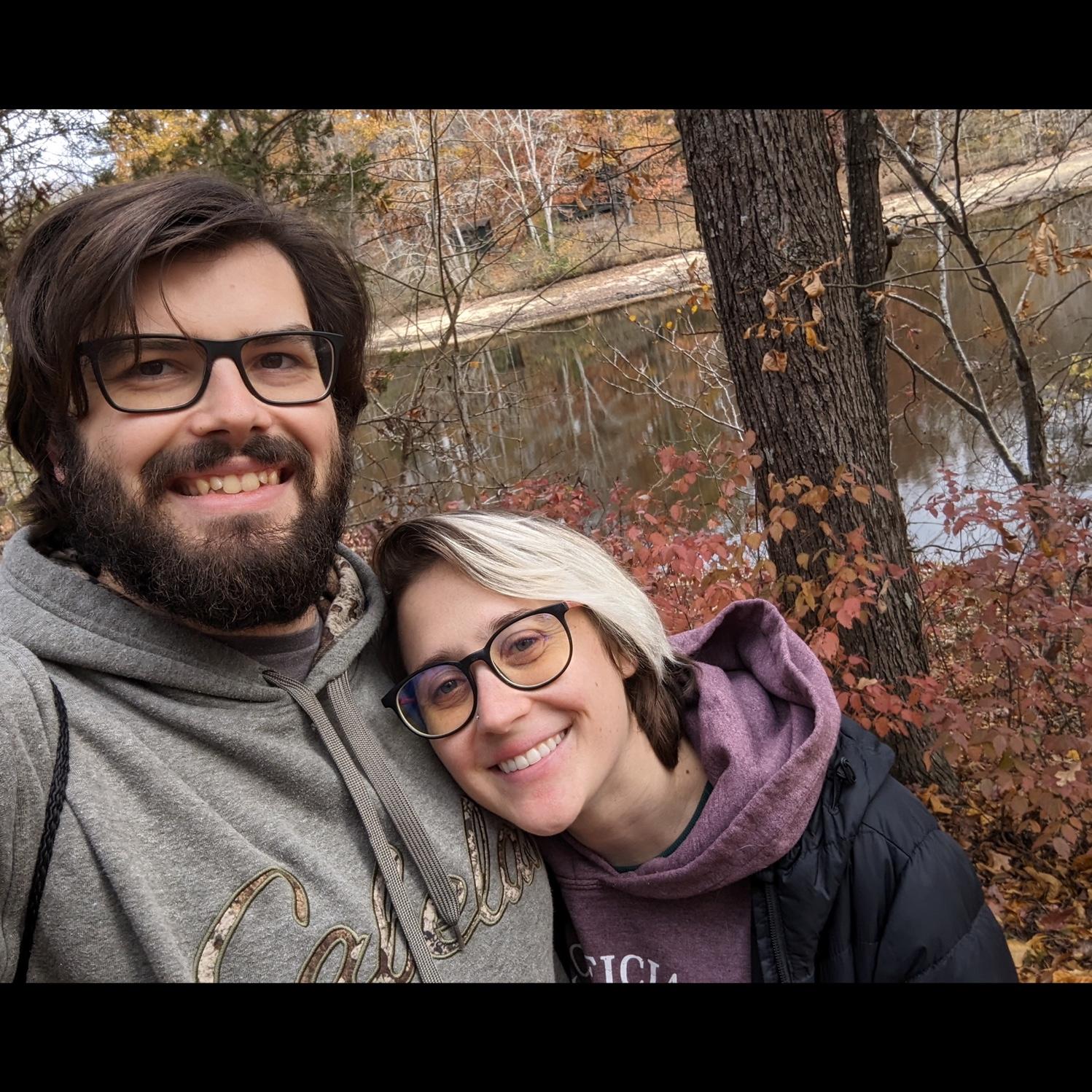 Pausing for pictures on Krista and Dalton’s favorite hiking trail around Lake Cammack in Burlington, NC, Fall 2023