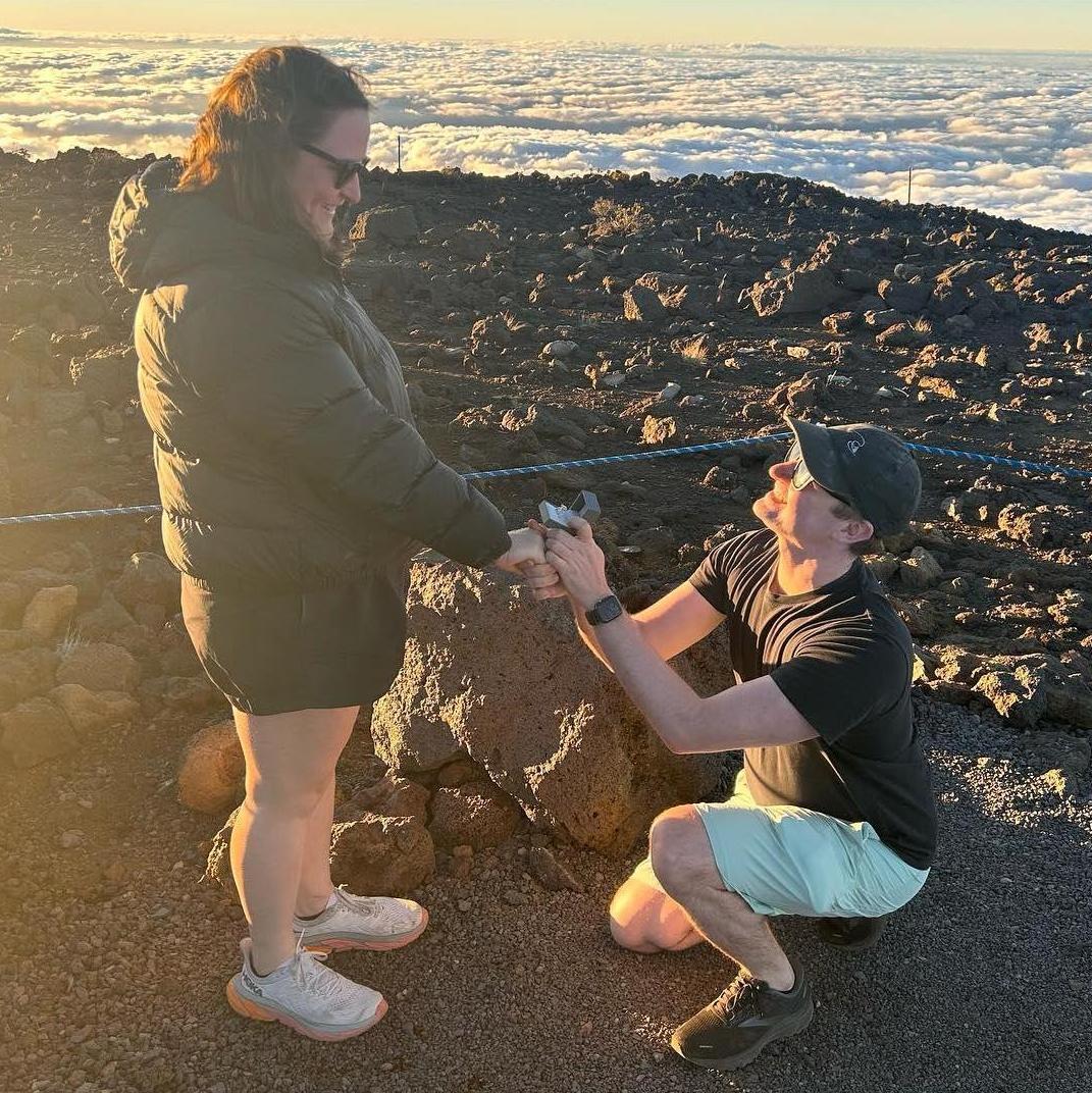 The proposal in Haleakala National Park. We asked a teenager to take a photo of us. He took a quick snap and handed back the phone. Paul said, "Can you take one more?" then got down on one knee.