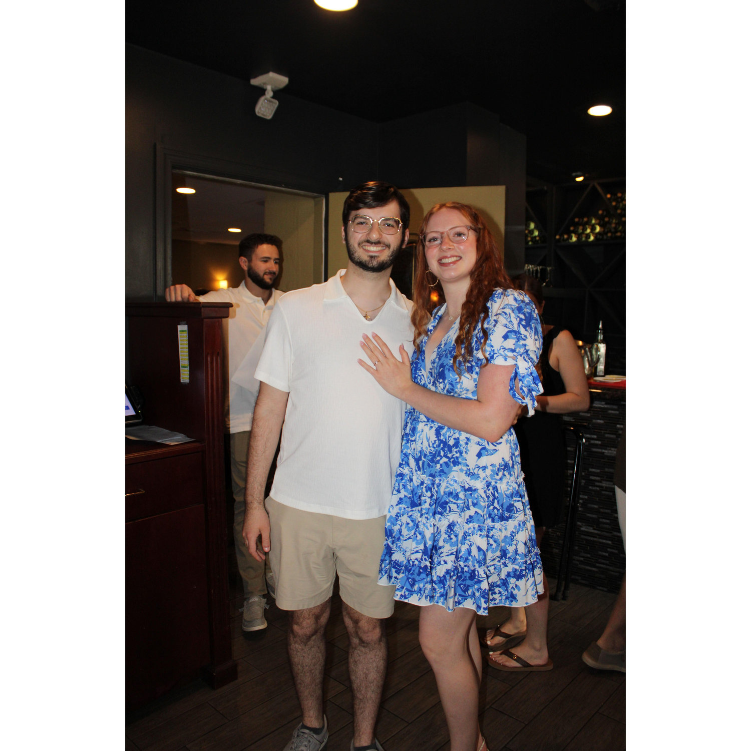 Moments after walking into our surprise engagement party!