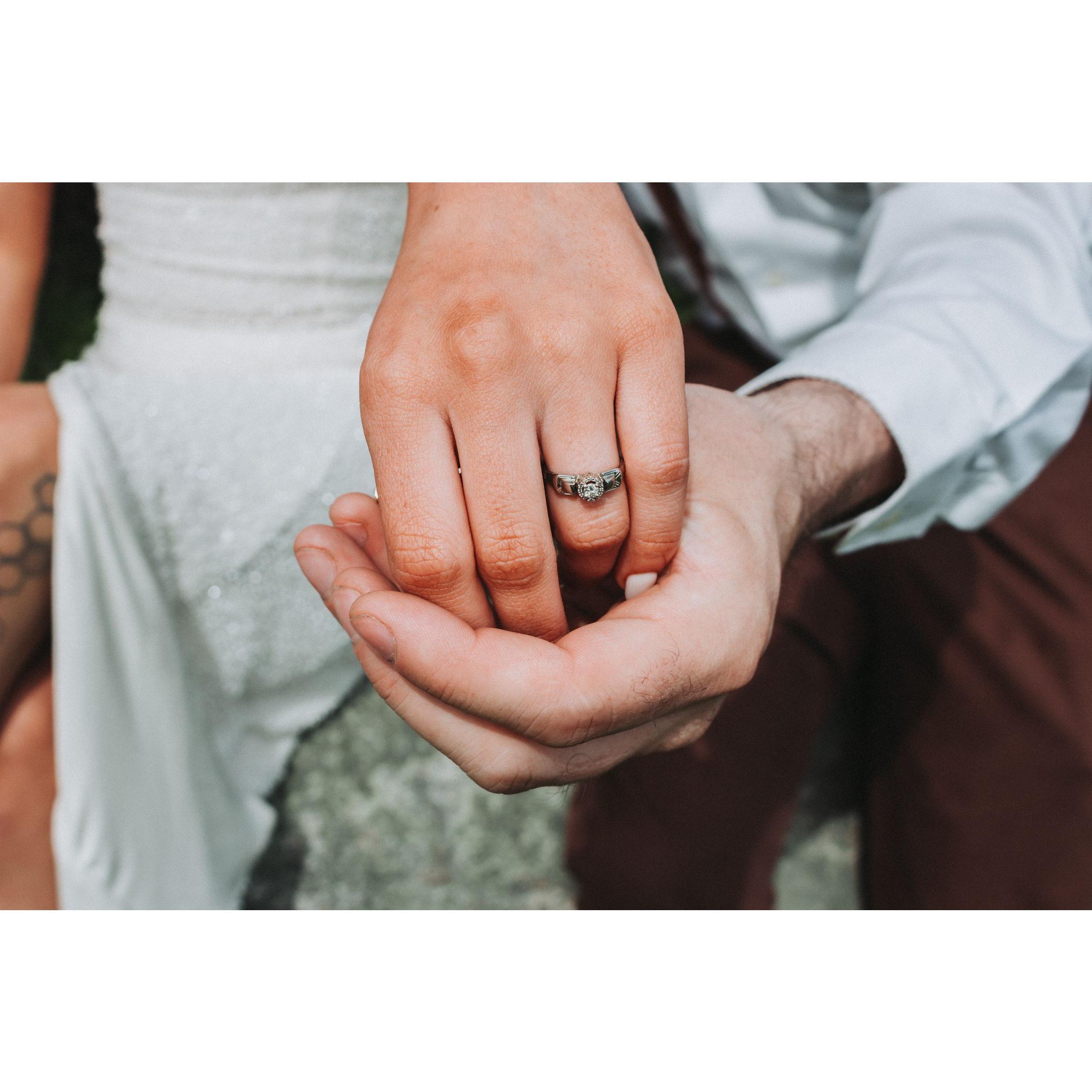 The Ring! This is a family heirloom from Alex's side that we had reset and resized.