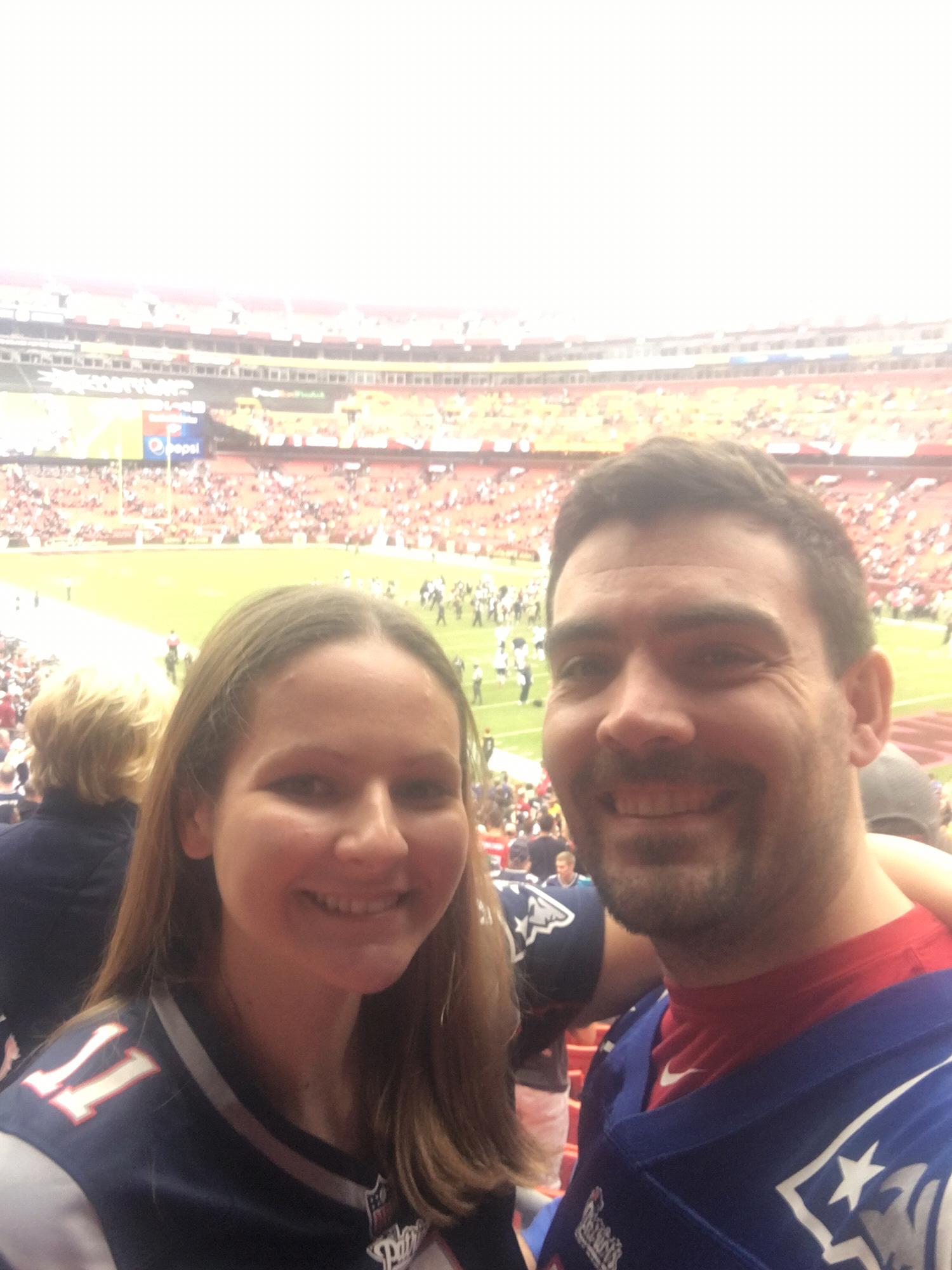 Watching the Patriots slaughter the Washington team ! (Sorry Mom)