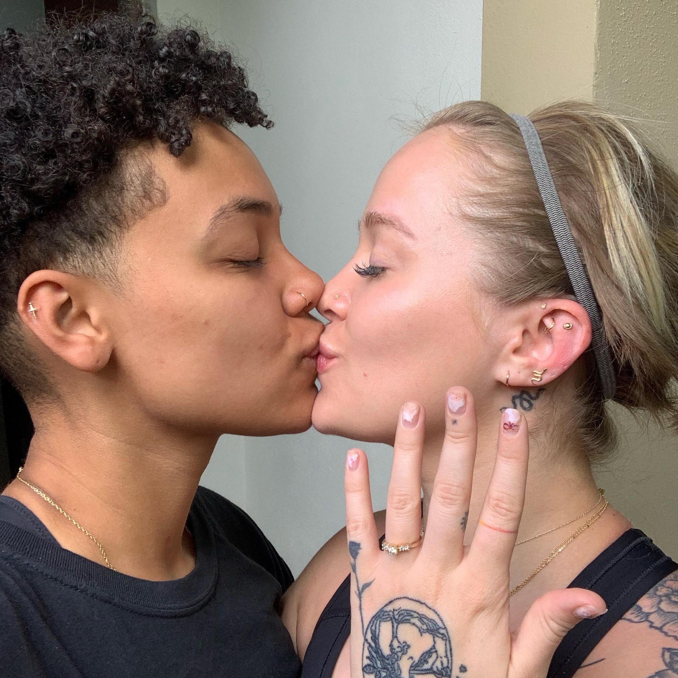 exchanging a kiss after announcing our engagement to family and friends.