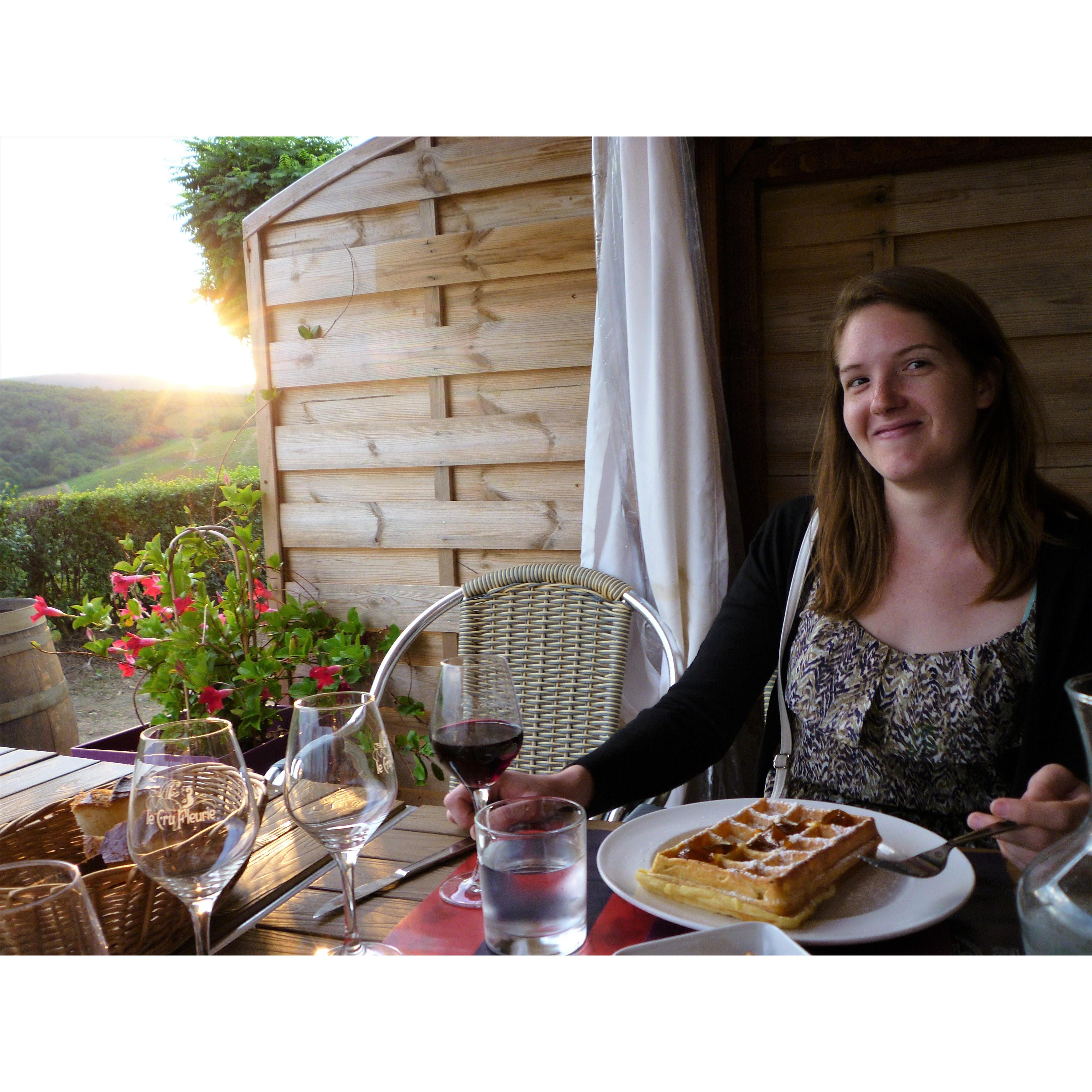 Rebecca making her "Yum yum wine" face in Fleurie, France. August 2014.