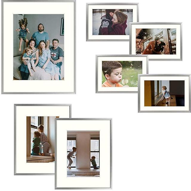 Frametory, 7 Piece Aluminum Wall Frame with Ivory Color Mat Set - Four 5x7 - Two 8x10 - One 11x14 - Real Glass - Swivel Tabs - Sawtooth Hangers (Silver)