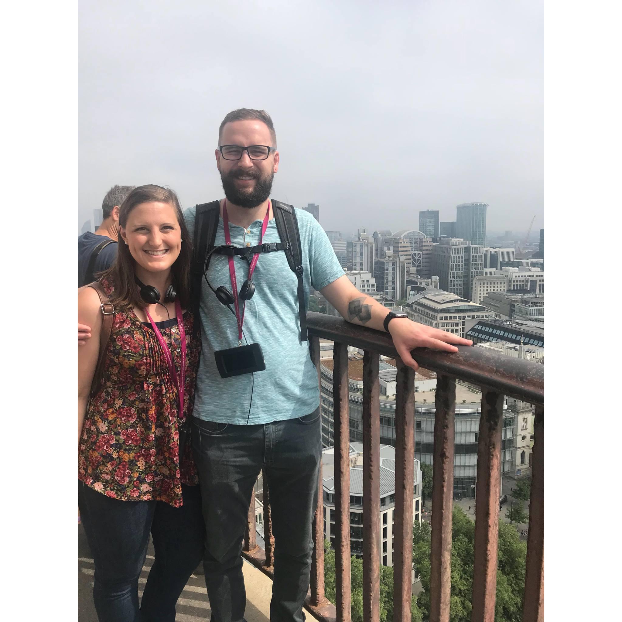 At the top of St. Paul's Cathedral in London, England. Surprise, also the same day Tom proposed!