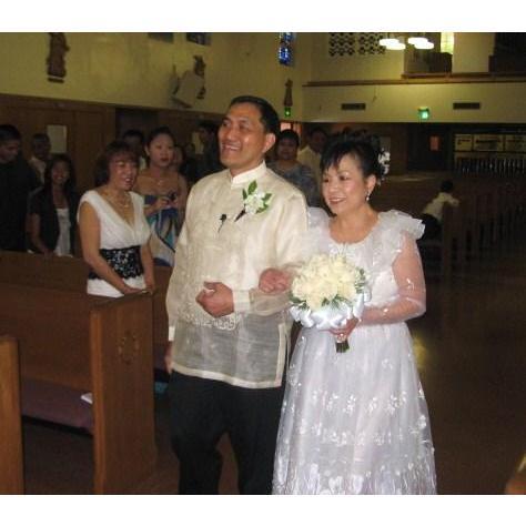 25th wedding Anniversary...Same gown she wore on March 17, 1984...still fits her after two decades...