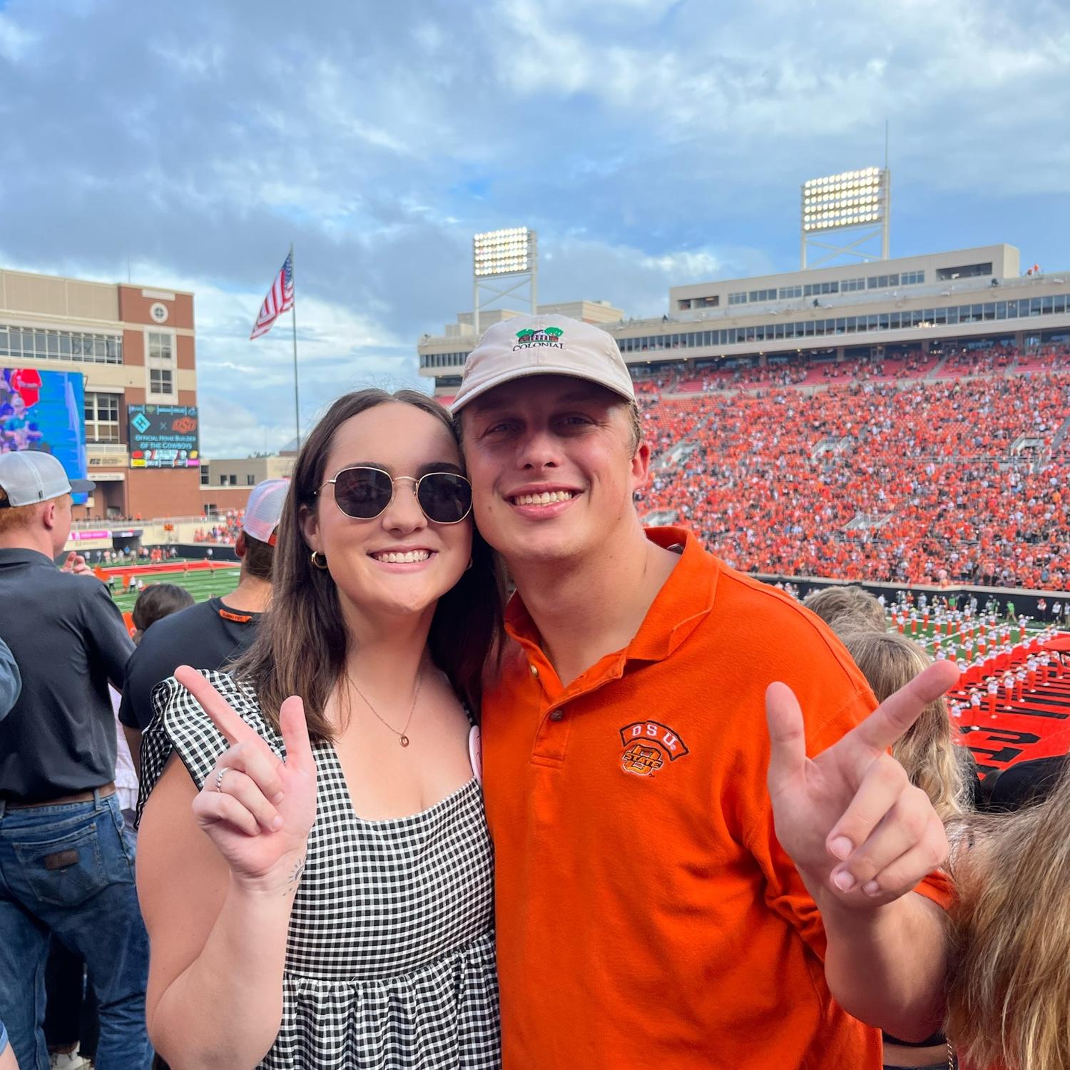 Our first pic together and our first football game together.
