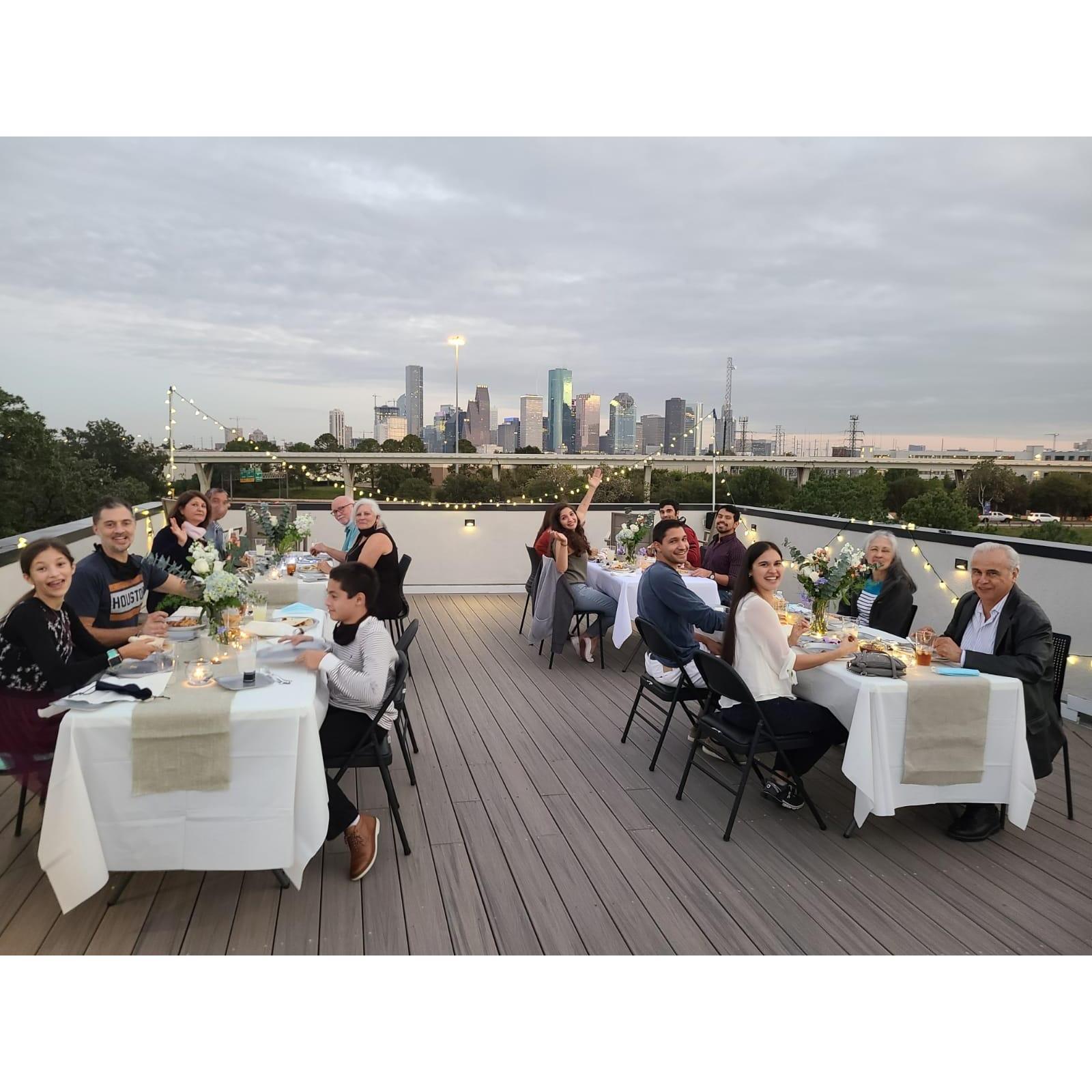 A rooftop celebration of family after the couples engagement!