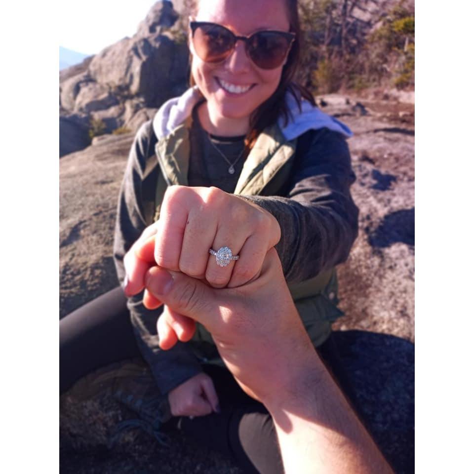 November 8th, 2020 she said YES! Alden proposed on top of Hurricane Mt. with a beautiful ring and bottle of champagne!