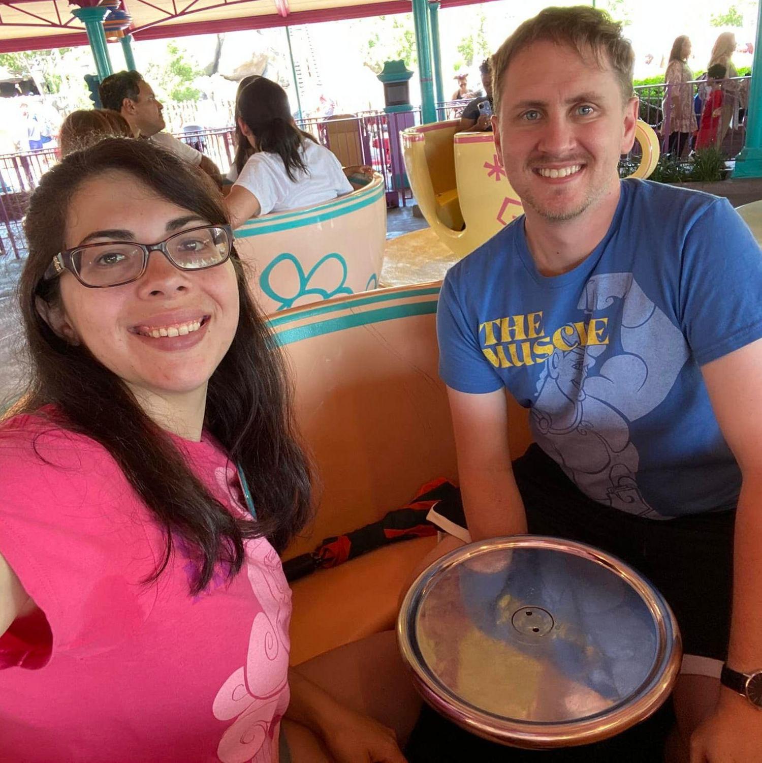 His says "The Muscle" and mine says "The Muse"; he always loves going on the tea cups to spin so fast! I get dizzy every time!