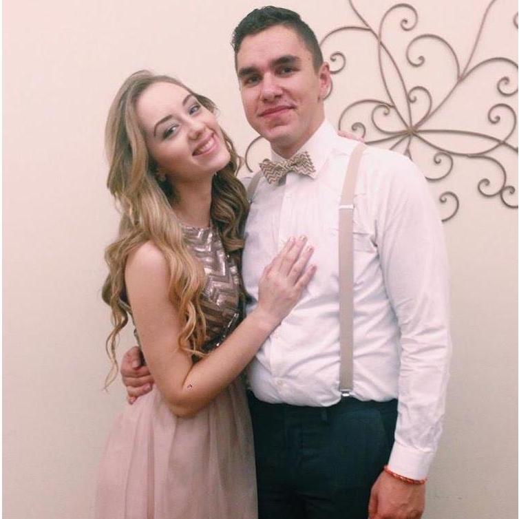 Winterball 2015 as sophomores! You know he's a keeper when he agrees to wear a chevron bow tie to match your dress.