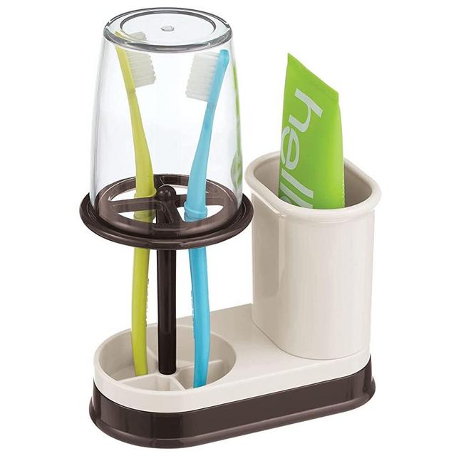 mDesign Decorative Plastic Bathroom Vanity Countertop Toothpaste & Toothbrush Holder Stand with Rinsing Cup/Cover - Dental Center Holds Electric Toothbrushes - Cream/Bronze