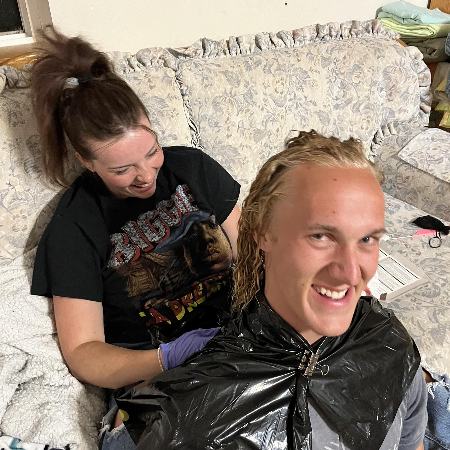 Susanna perming Ben’s hair