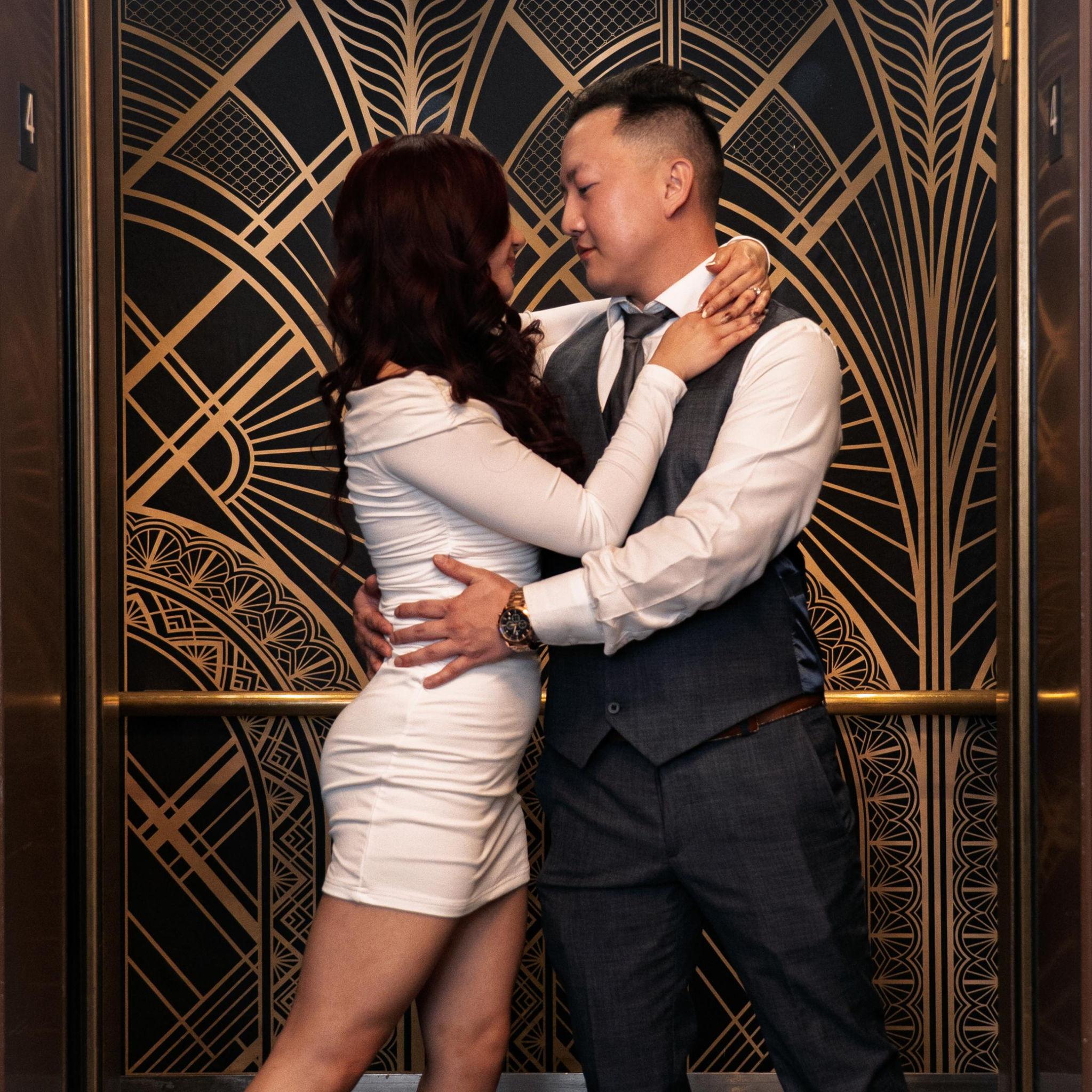 Dancing in the elevator after our hotel bar date