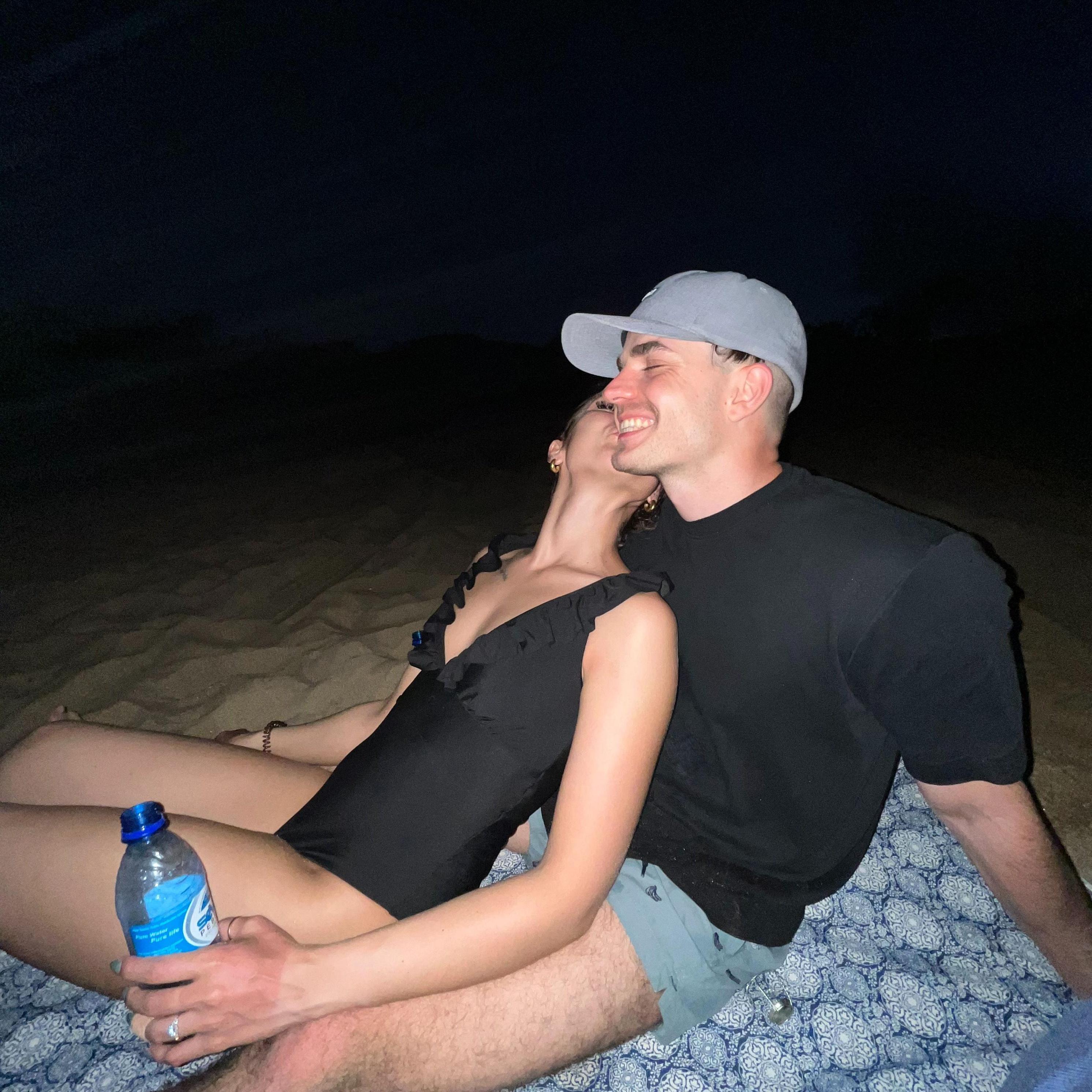 Drinking champagne out of water bottles on the beach in Sodwana.