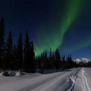 Searching for Northern Lights via Snowmobile