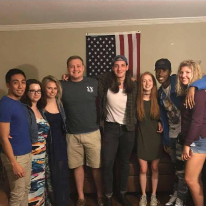 The final group photo in Will's apartment after graduation.