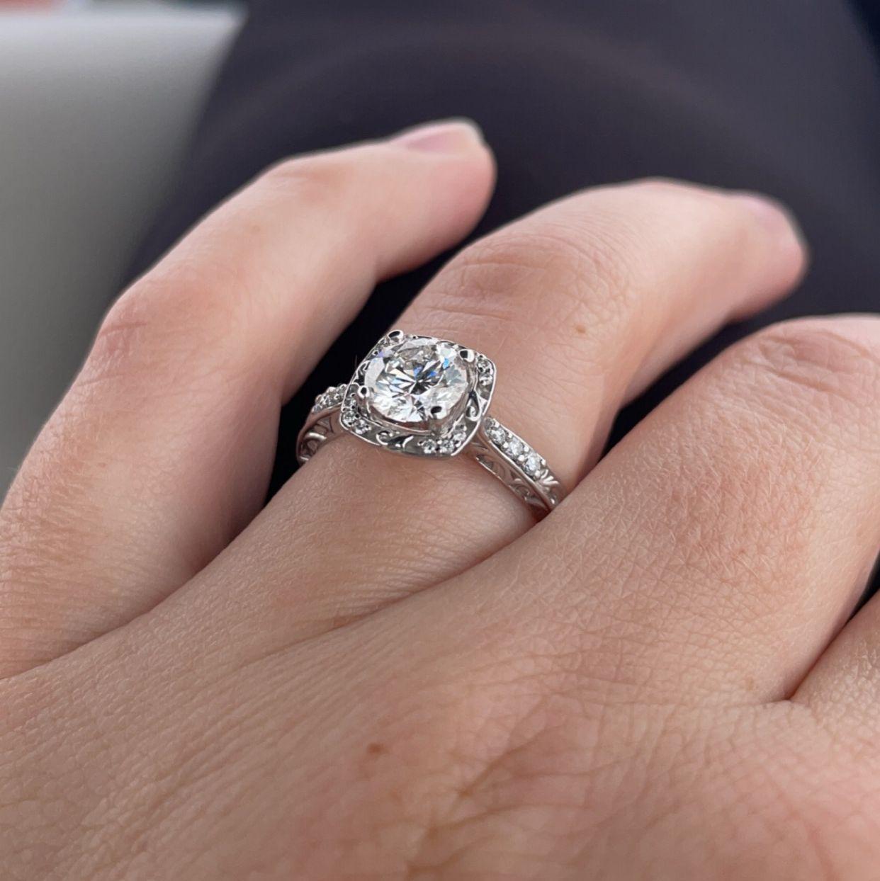 Brian did an excellent job picking Abby's ring -- it's absolutely gorgeous. This was taken the day after we got engaged because Abby couldn't stop looking at it.
