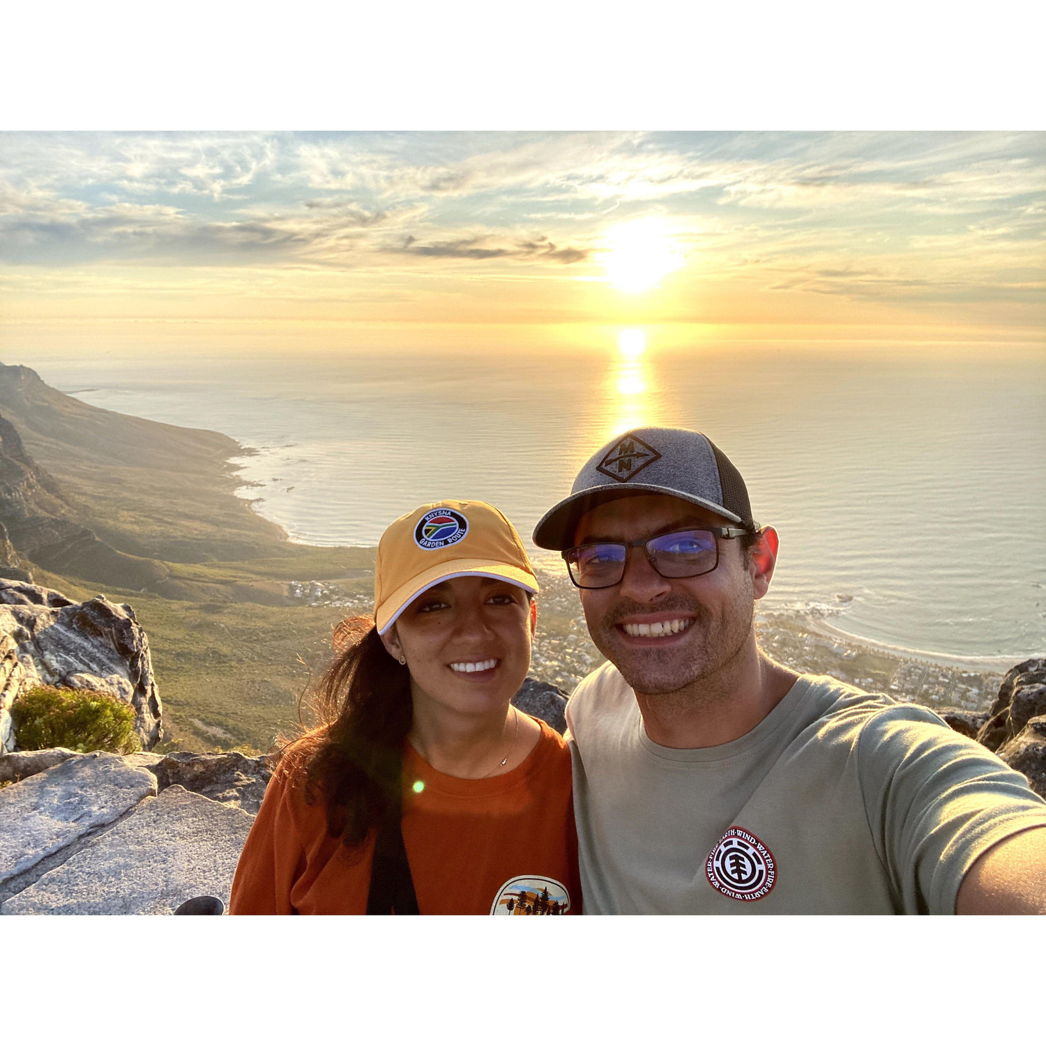 On Pau's second trip to South Africa, I had to take her to Cape Town. This is us at sunset on top of the famous Table Mountain.