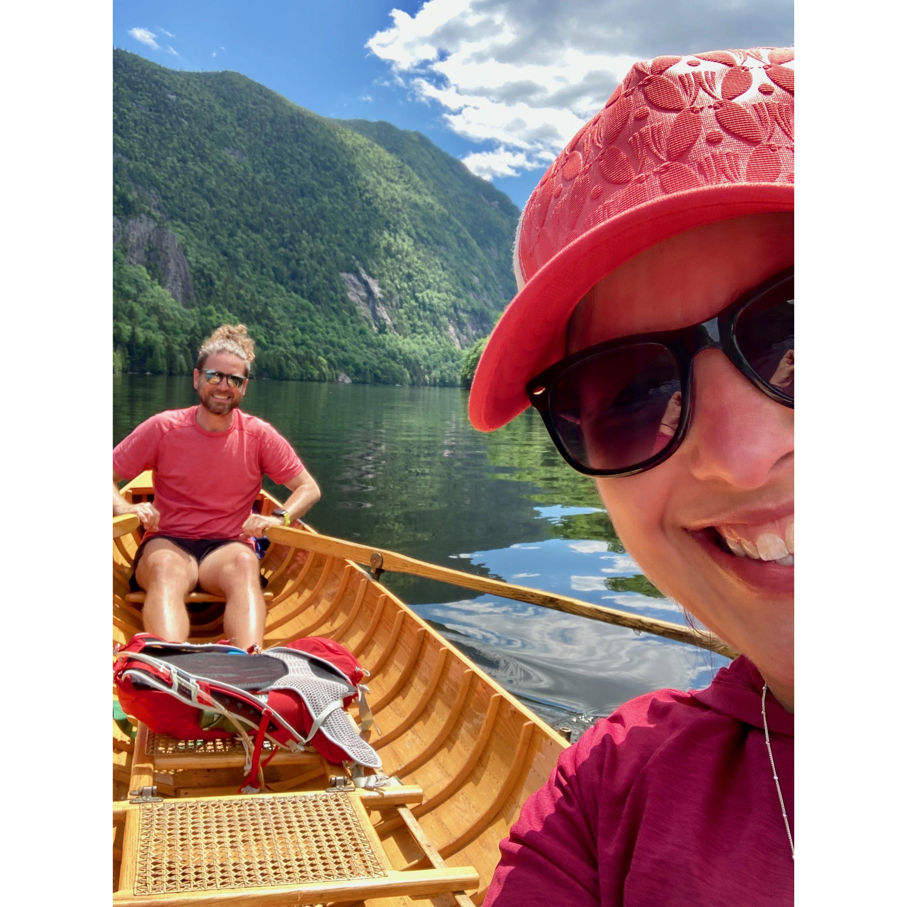 Andrew tries his hand at rowing a Long Boat on the Lower Ausable Lake.