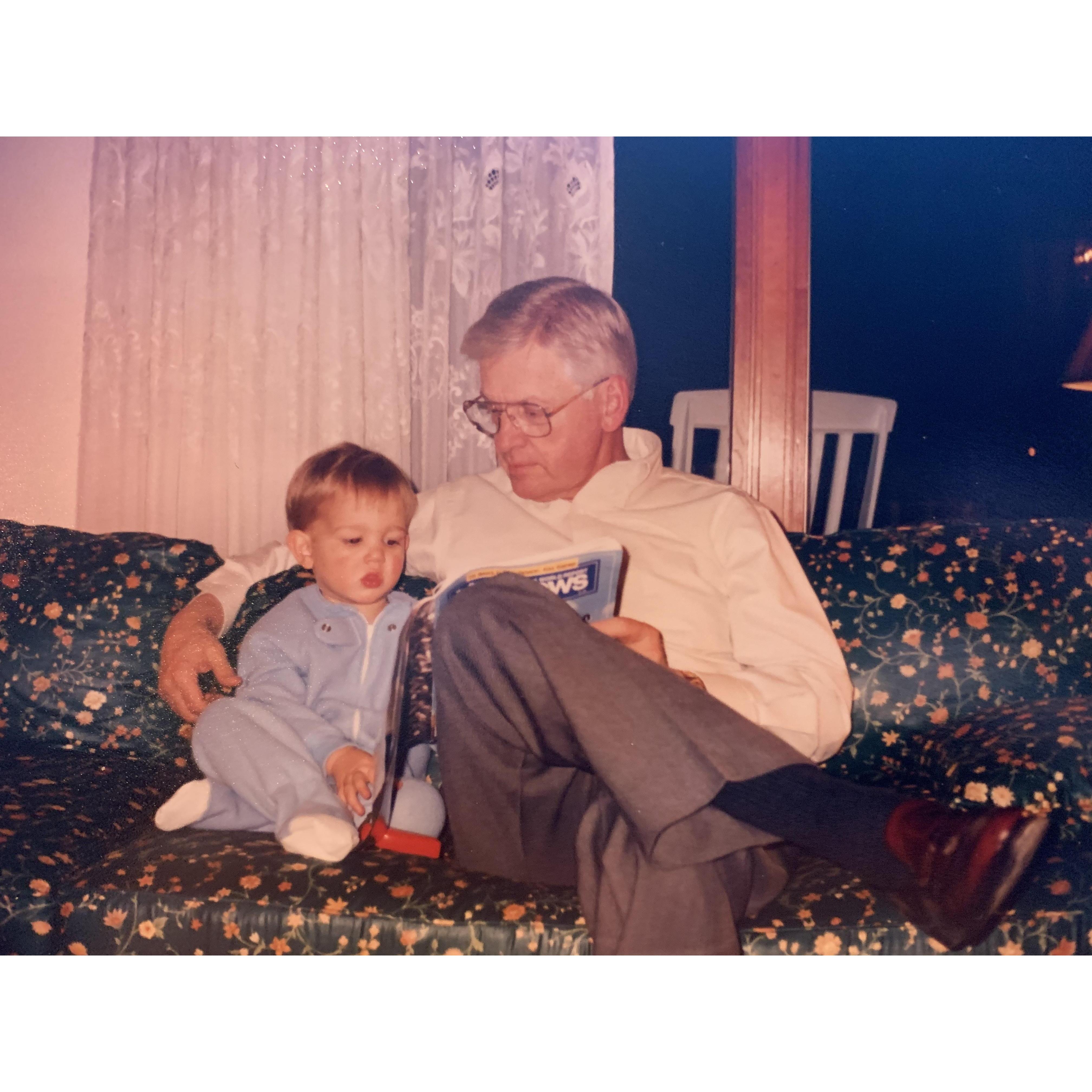 Grant reading to Grandpa Nick.