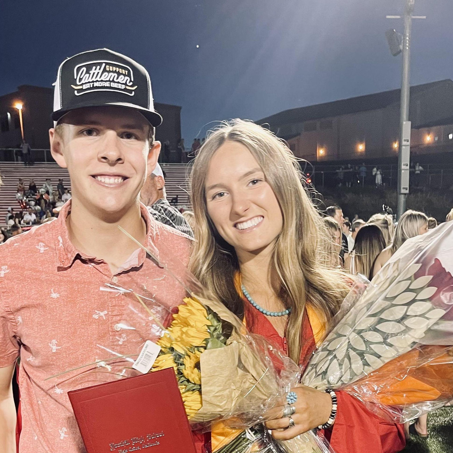 A picture of us at Grace's senior year graduation. June 2022