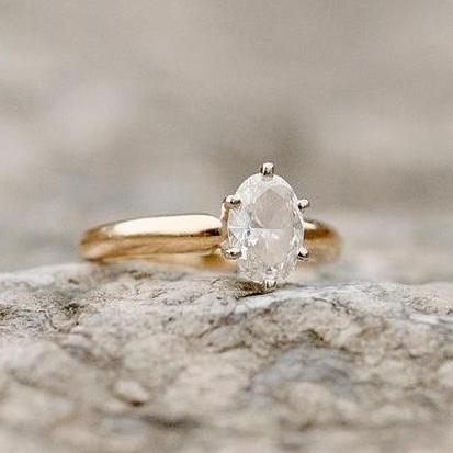 A photo of Amanda's beautiful engagement ring! Francis did a great job in picking out the ring with his dad.